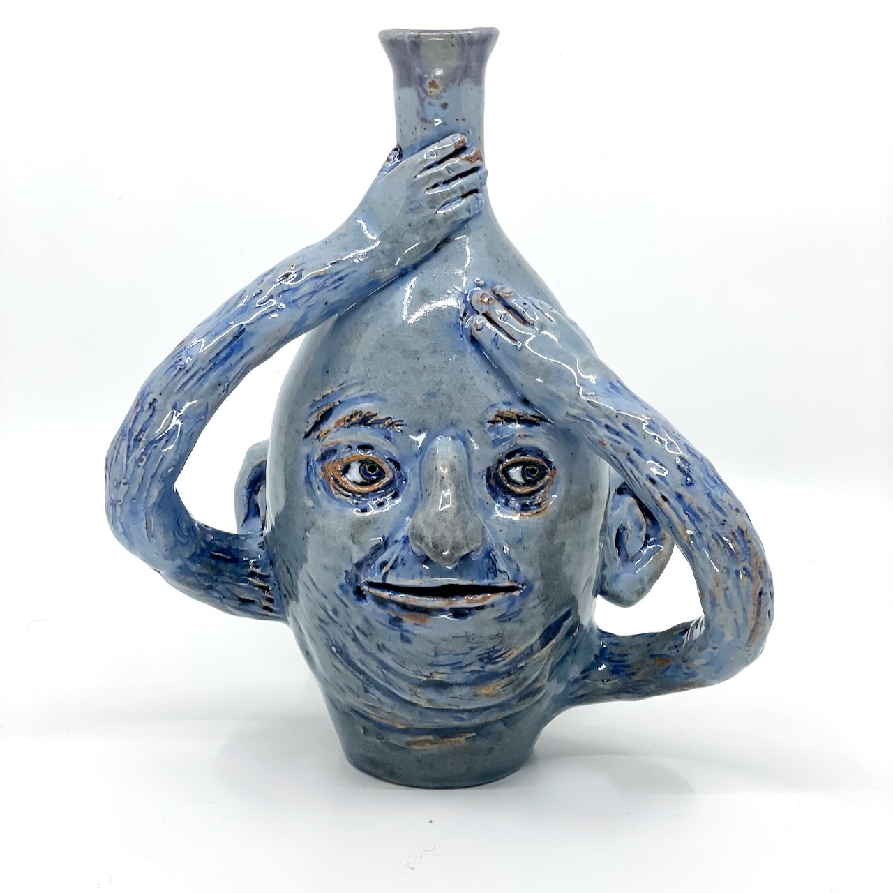 blue bottle vase
9.5 x 8 x 5.5
2025
$