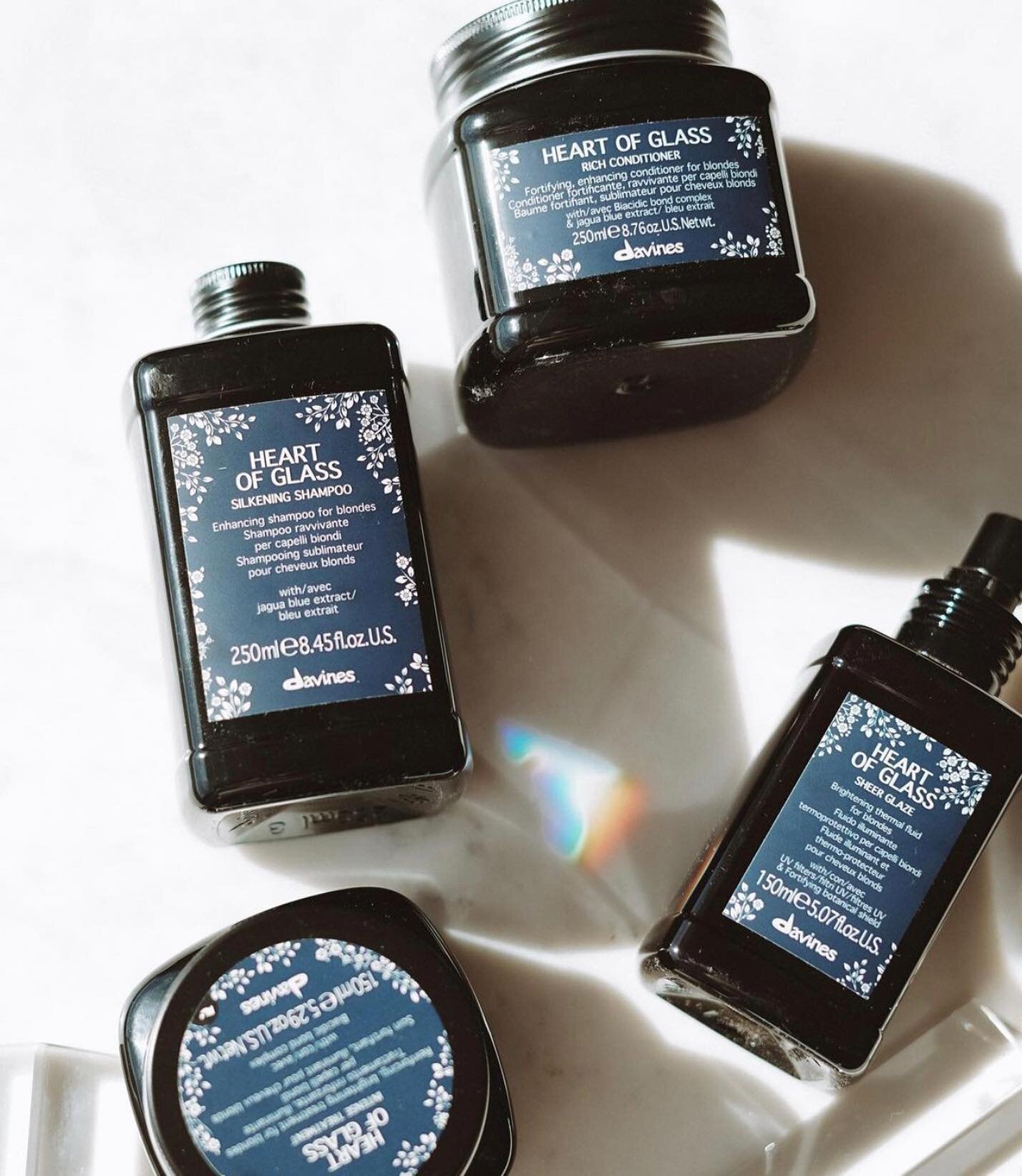 ATTENTION BLONDIES! We are OBSESSED with this new Davines product line and you will be too! HEART OF GLASS is designed to highlight the beauty of your blonde✨it&rsquo;s unique indigo blue color will help steer cool tones away from warm hues, and prev