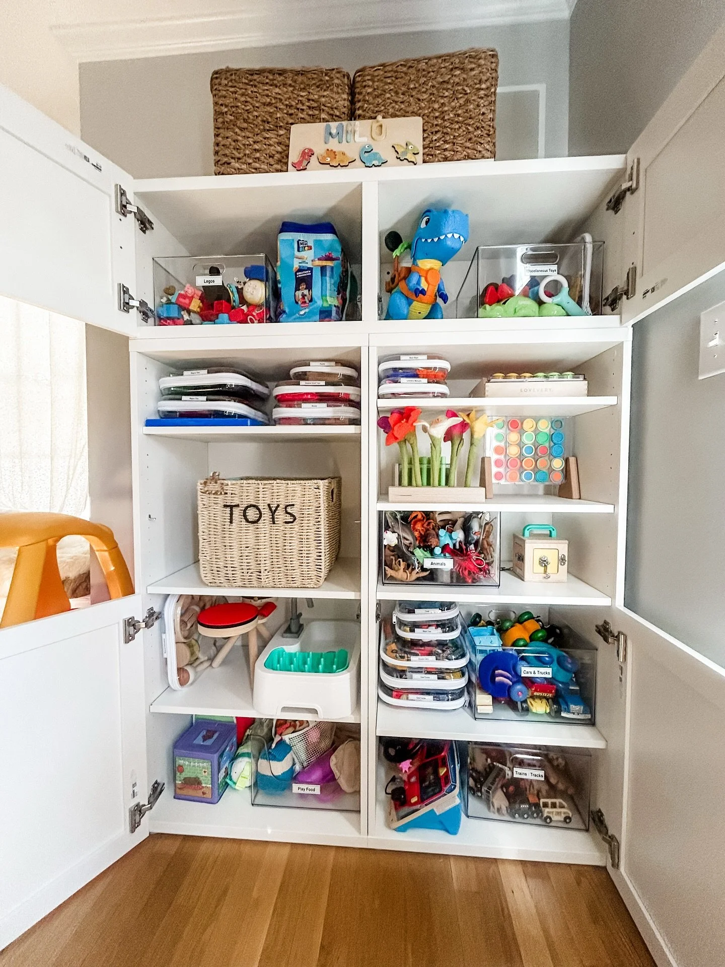 Swipe to see how to finally get #toys off the floor! We designed this @ikea storage solution to give our clients a sense of calm and order at the end of the day! A system provides #kids an easy and fun #playspace to enjoy 📷 @itsorganized #playroom #