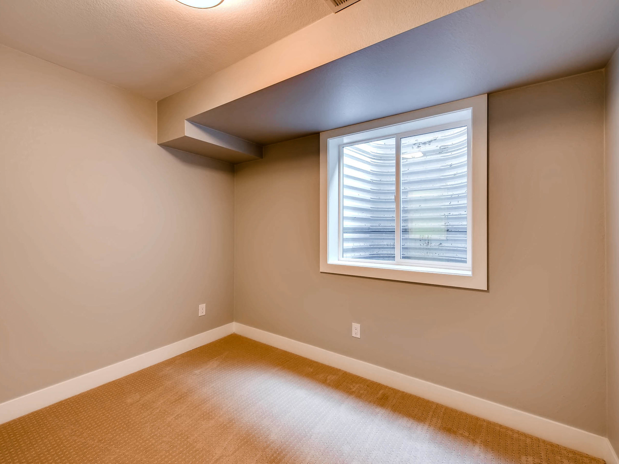 556 Madison St Denver CO 80206-MLS_Size-025-17-Lower Level Bedroom-2048x1536-72dpi.jpg