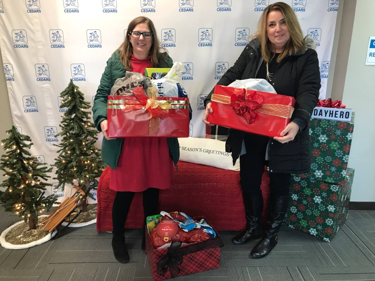 NAI FMA professionals dropping of donations of gifts