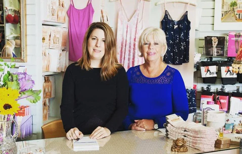 Larisa & Bella love working together to help our customers. We create a kind and respectful environment for a vast range of smart & discerning women. (Photo at the original Chantilly Lace on Central Street.)