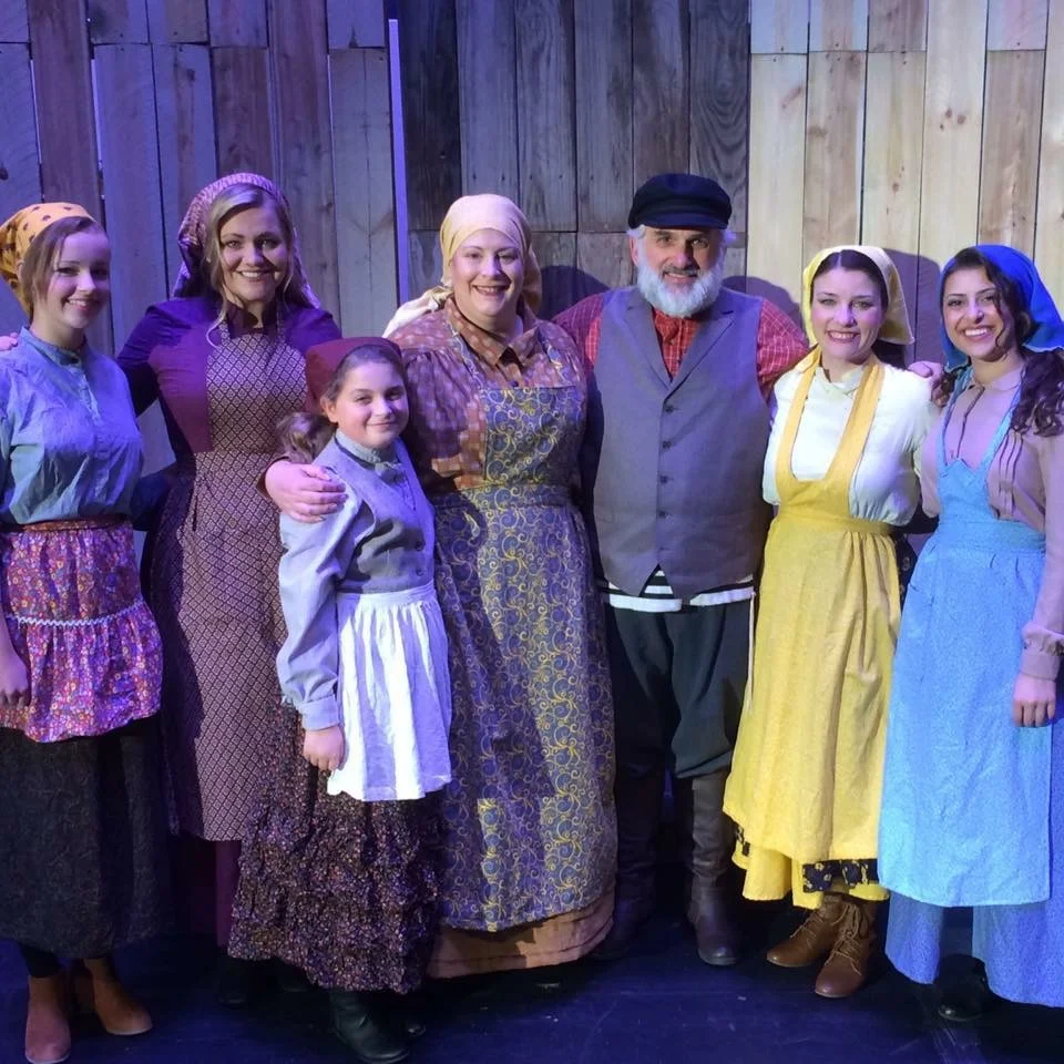 Tevye, Golde and his daughters