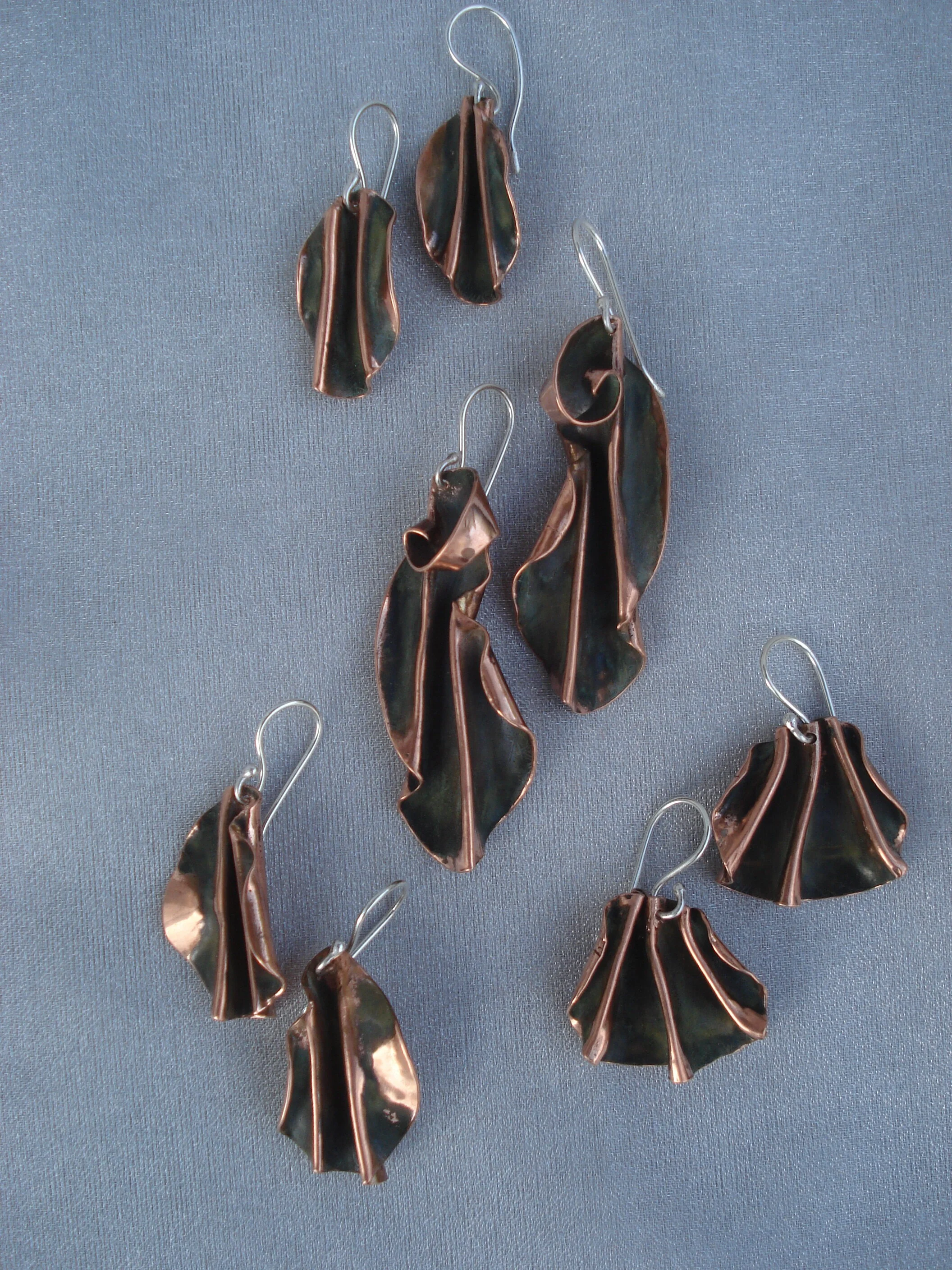 Midnight Sun patina on polished copper earrings. 