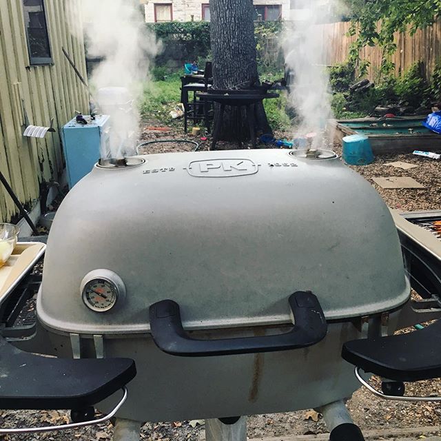 Lump charcoal and post oak making magic with lamb burgers. Monday night happy place. #anynightgrilling