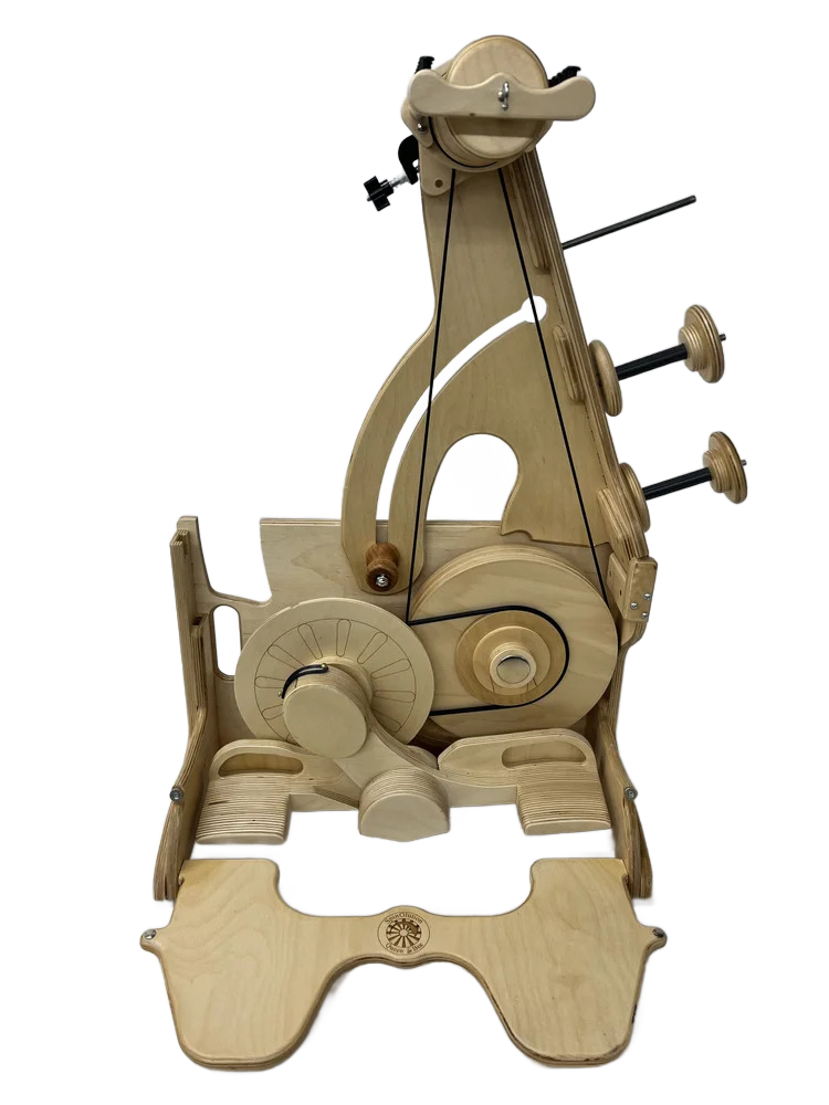 A wooden mechanical model resembling a giraffe with gears, pulleys, and levers.