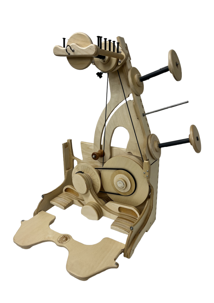 A wooden mechanical puzzle featuring gears, levers, and pulleys, with decorative carved floral patterns.