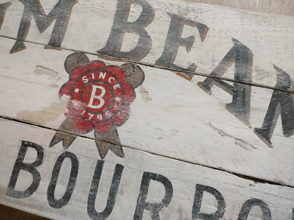 Jim Beam board after sanding - note light sanding all over with heavy sanding in areas.