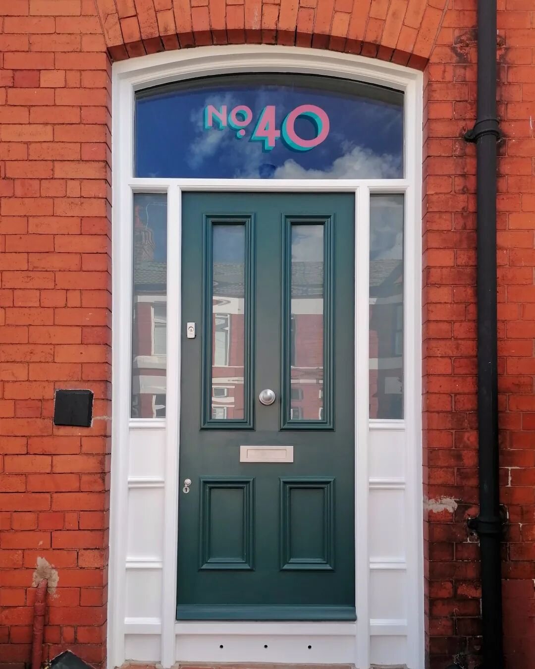 No. 40.

Another house number from last week. No gold on this one, just paint.

Draw up to spec on site before painting in reverse. Hard to get good photos but I love the contrast of modern numbers against a traditional door.

Want something similar?