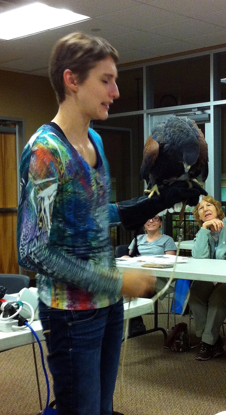 Rehabilitator Stephanie Boyd with hawk