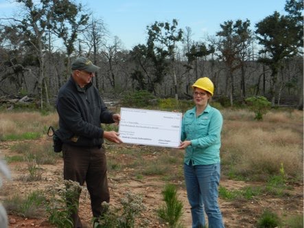  Big check to Tree Folks for forest restoration 
