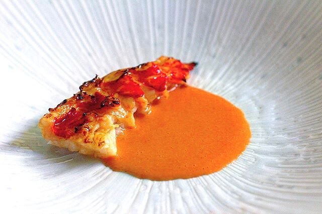Grilled lobster glazed with dry aged beef paste. Lobster sauce made from the shells and head