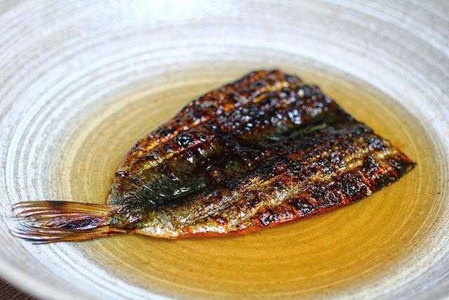 Grilled sardine from Chiba. Tomato broth
.
.
.
The sardine is butterflied making sure to not break the skin. The spine is removed and the bigger bones are removed. It&rsquo;s then cured with salt and sugar for 20 minutes. Rinsed. Dried. Left on a rac