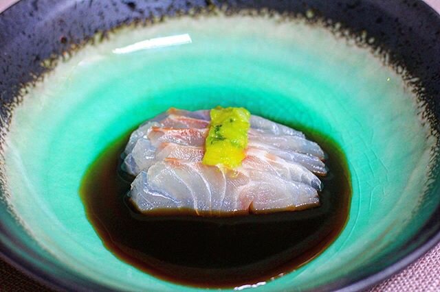 Isaki from Oita. Lemon scallion paste. Maple soy .
.
.
The isaki is cured in salt and sugar for about 20 min. Rinsed. Patted dry. This improves the texture and helps the fish become more iridescent. The lemon and scallion paste is simply lemon zest, 