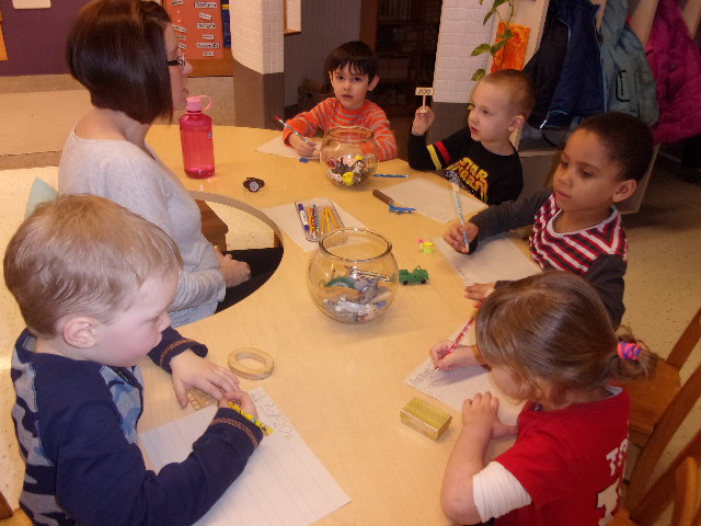 Inventive Spelling at the literacy table.