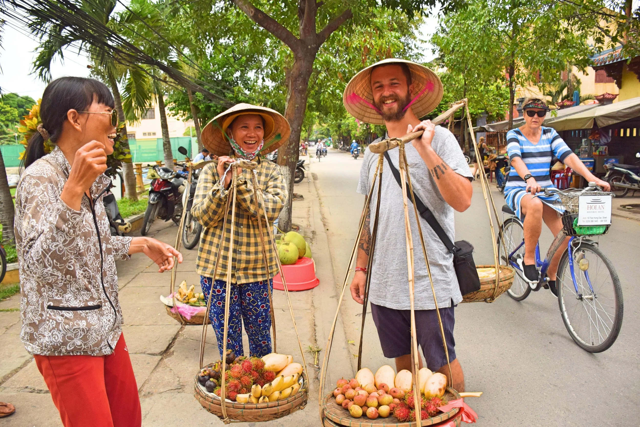A typical Hoi An scam: "Take a photo, it's free" they say. Worth it though ;)
