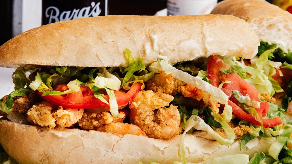 Po Boy - New Orleans is known for its grand restaurants, but the more humble option is the very popular Po' Boy. It almost always consists of meat, which is usually roast beef or fried seafood, often shrimp, crawfish, fish, oysters or crab. Another form of the po’ boy is a BBQ po’ boy. These can be found at almost every restaurant or street corner. Pairs great with a hangover!