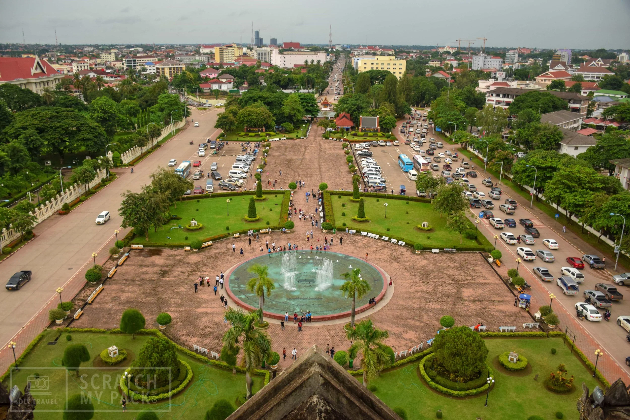Vientiane: View of the city from inside the "Arc de Triumph" - The Arc is a gorgeous landmark in the middle of the city, directly down the street from the Presidential Palace. It has the nickname “The Vertical Runway” as it was built with concrete given by the Americans for their airport runways. This was built instead.