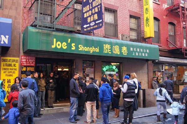JOE’S SHANGHAI. This Chinatown staple has the best soup dumplings EVER. Be careful, the food is HOT, and the service can be less than friendly, but hey, that’s part of the experience. The hours can be spotty, but you can get equally good soup dumplings at Shanghai Asian Manor . ($15 per person)