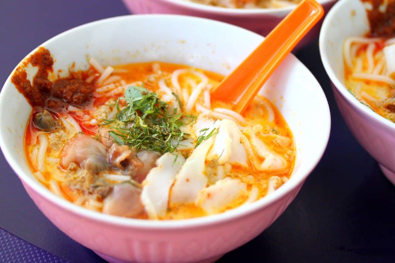 Laksa - Laksa is a spicy noodle soup popular in Peranakan cuisine. Laksa consists of rice noodles or rice vermicelli with chicken, prawn or fish, served in spicy soup based on either rich and spicy curry coconut milk or on sour asam. Laksa is found in Indonesia, Malaysia, and Singapore.