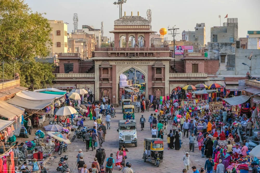 Clock Tower/Sardar market Square - An overwhelming square smack-dab in the middle of the city chalk-full of food stalls, family run shops pushing textiles on every passerby, and awesome sights of cows, elephants, goats, dogs, children, ancient motorbikes, and old women balancing bags of unknown weight on top of their head. This square has an old clocktower in the middle (go to the top of the clocktower for this view for only 30INR).