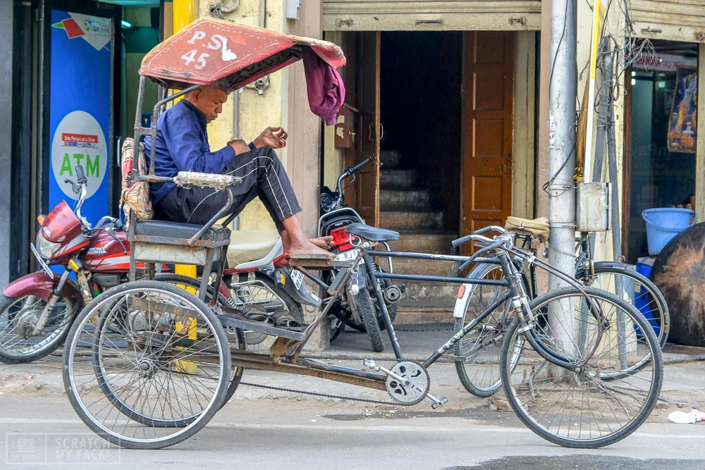Getting Around The City - Uber, hired tourist car, taxi, rickshaw (pictured), tuk-tuk or your own two feet, Agra is easy to get around and without shortage of drivers. Make sure when you are booking your hotel (we recommend an awesome one down below) is in the area next to the Taj Mahal itself. Sure, you may pay maybe $4 more a night, but this you will save in transportation cost. The most important rule if you are taking a tuk-tuk and don’t want to overpay is this : download the Uber app (Uber is cheap in India) and put in your route to find what the fare price is - now you know the maximum amount you should pay for a tuk-tuk.