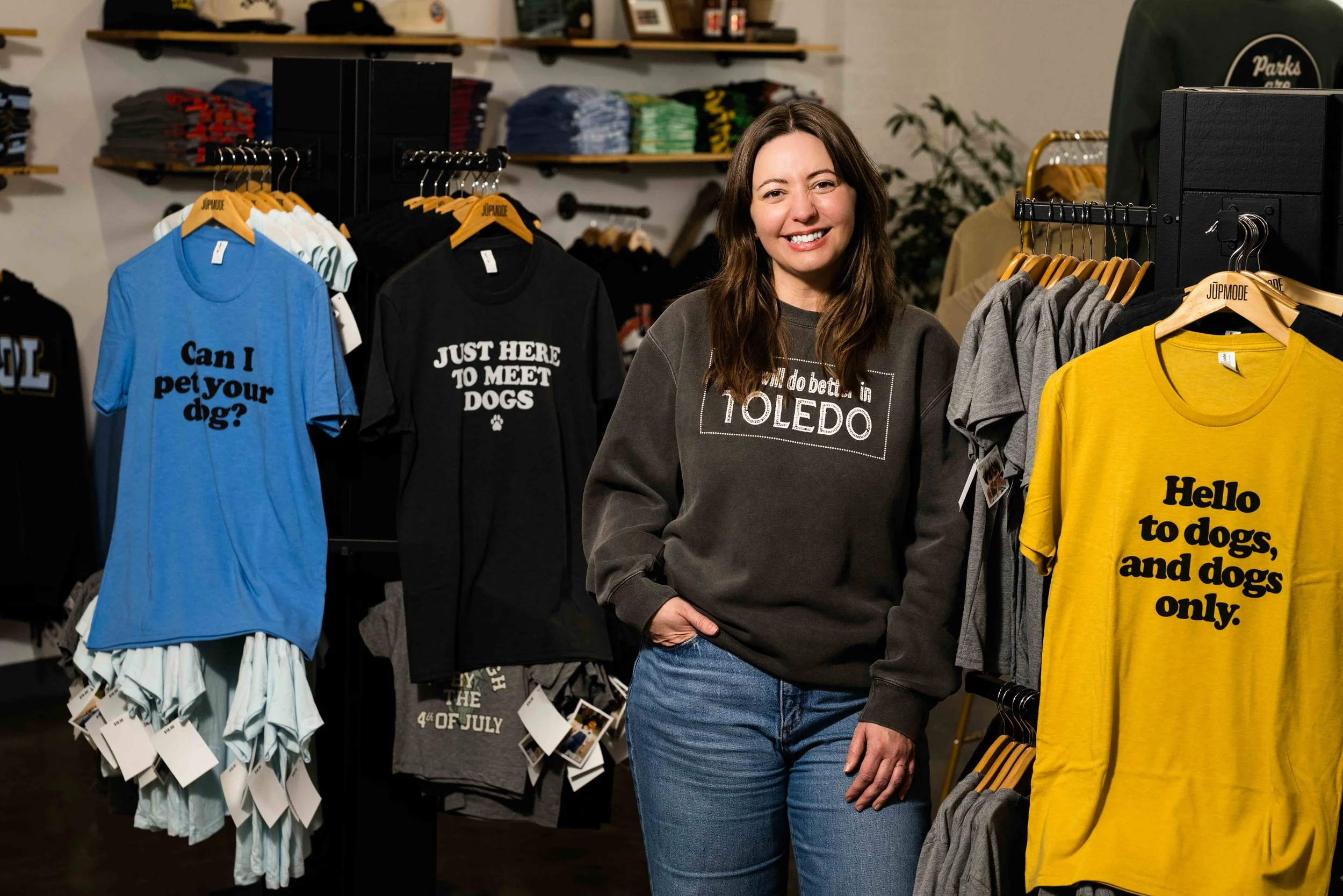employee with dog themed shirts in jupmode retail space