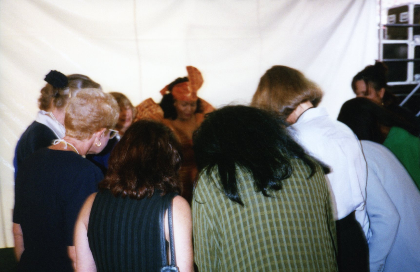  Women praying before the event 