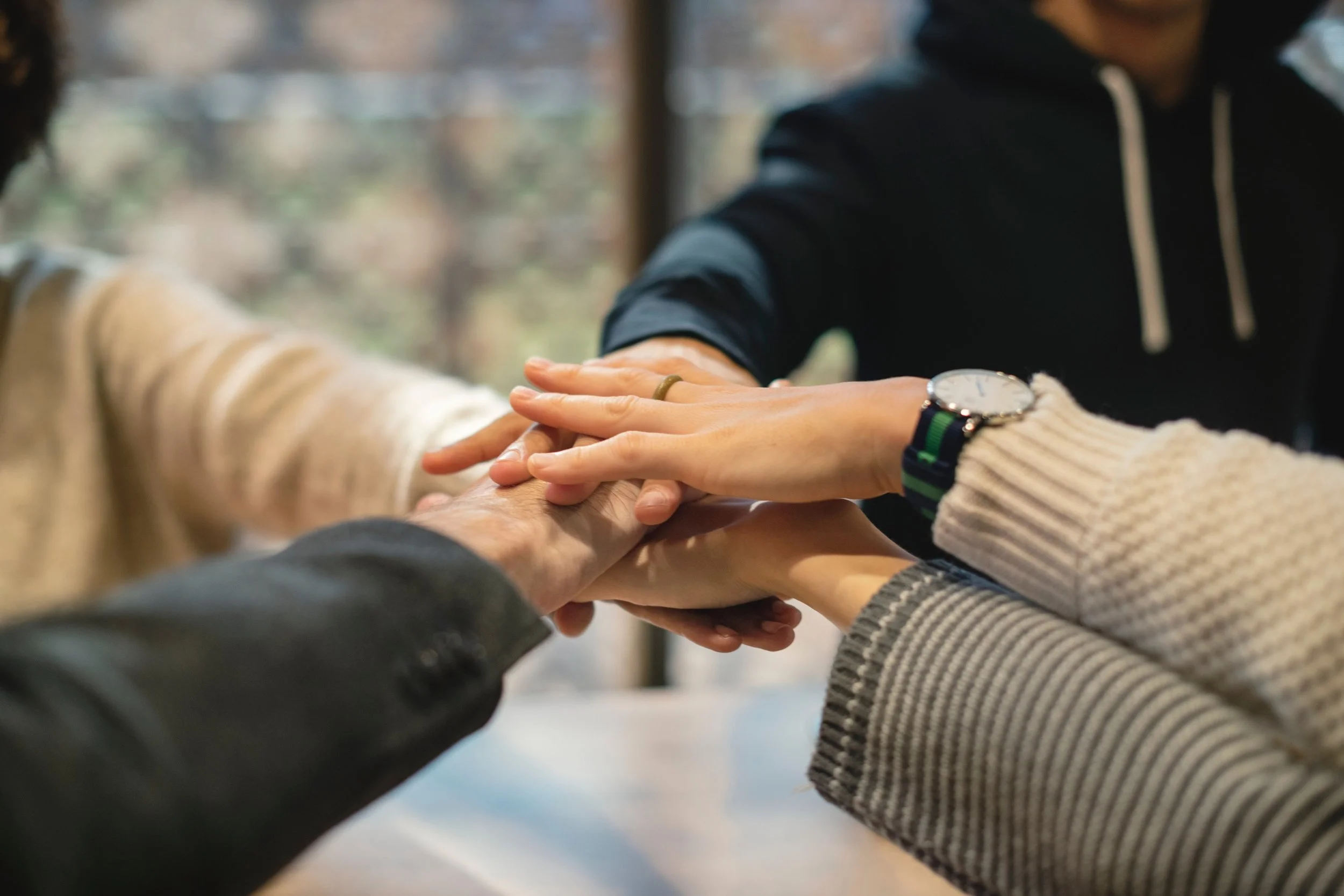 Hands together rawpixel-651373-unsplash.jpg
