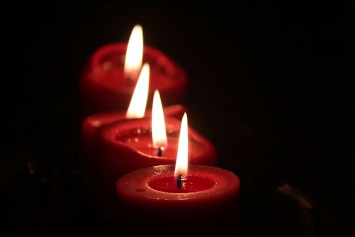 four lit candles