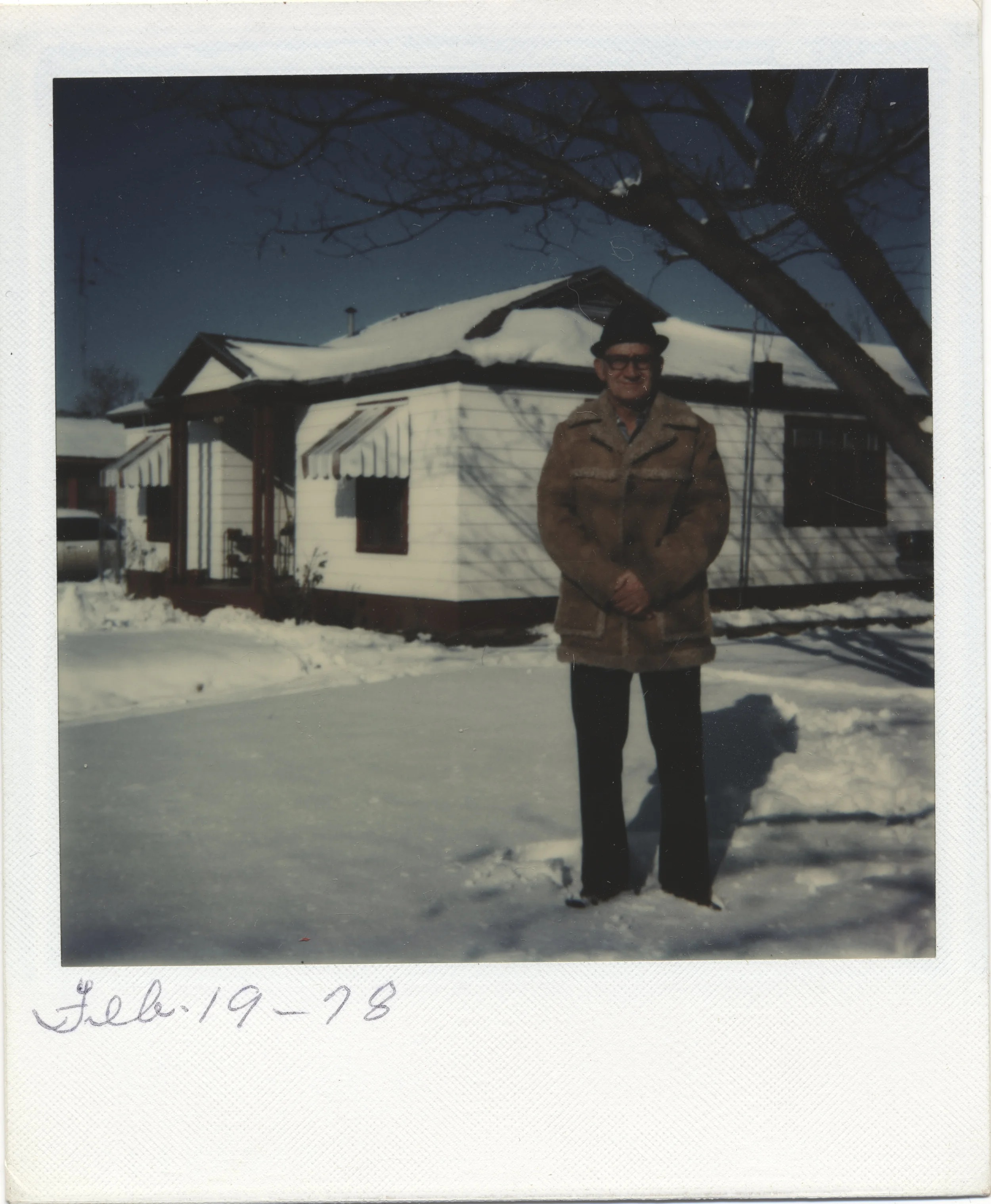 My grandfather in 1978, yes that is snow in Fort Worth Texas. Polaroid FIlm