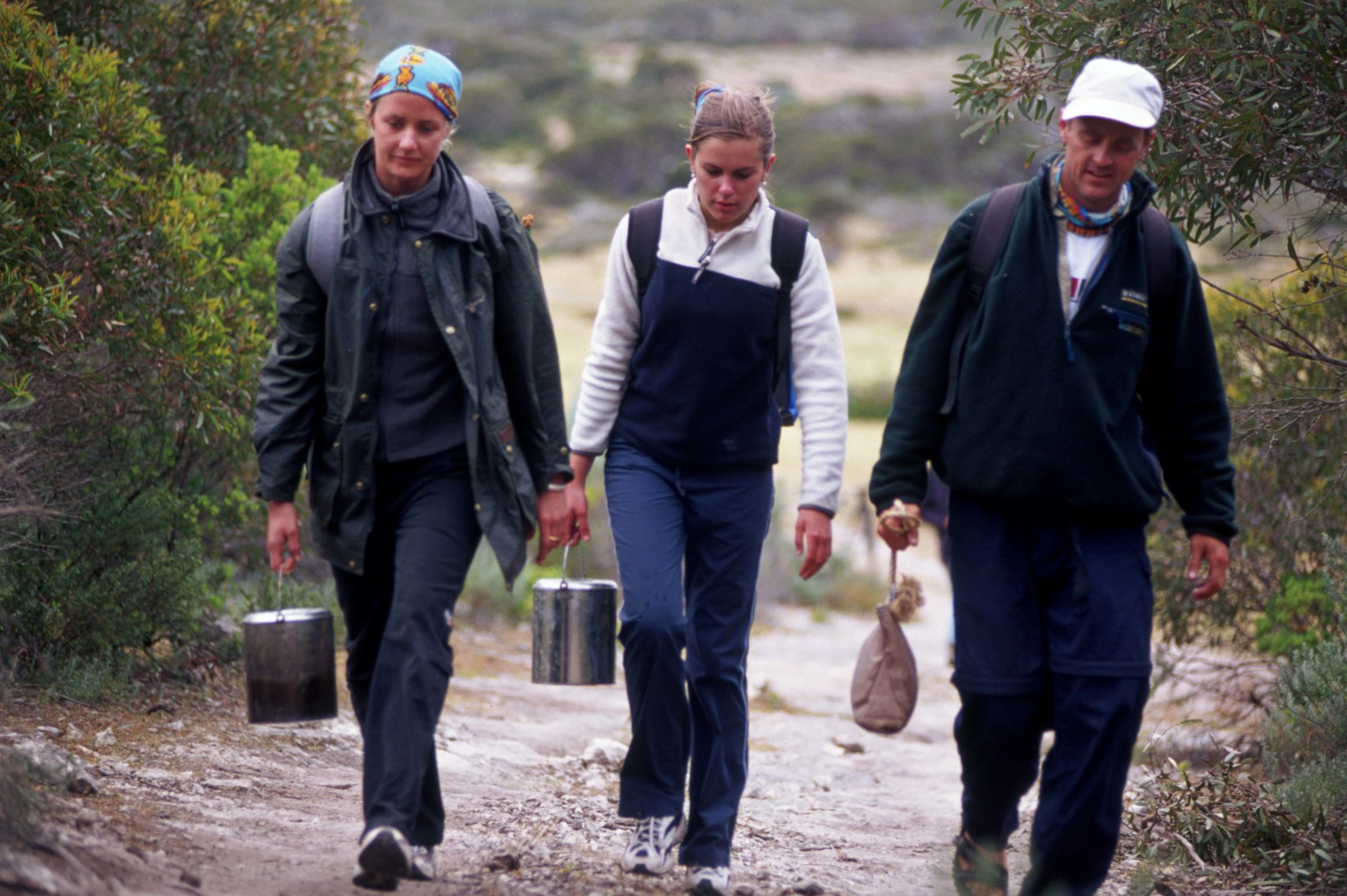 Bringing dirty water back from the well 3km walk