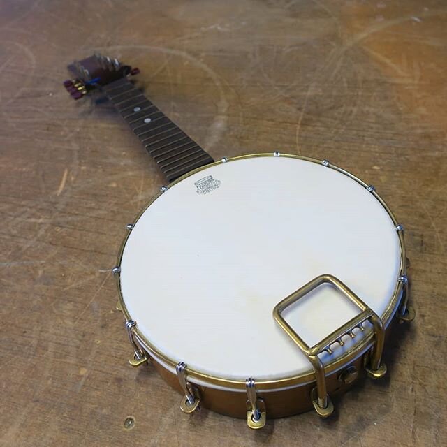 Little banjo reheaded with fine gauge Kentville Kangaroo Hide for @maxxmusiconline this week.  Love me a banjo,  but only for looking at, on account of can't play