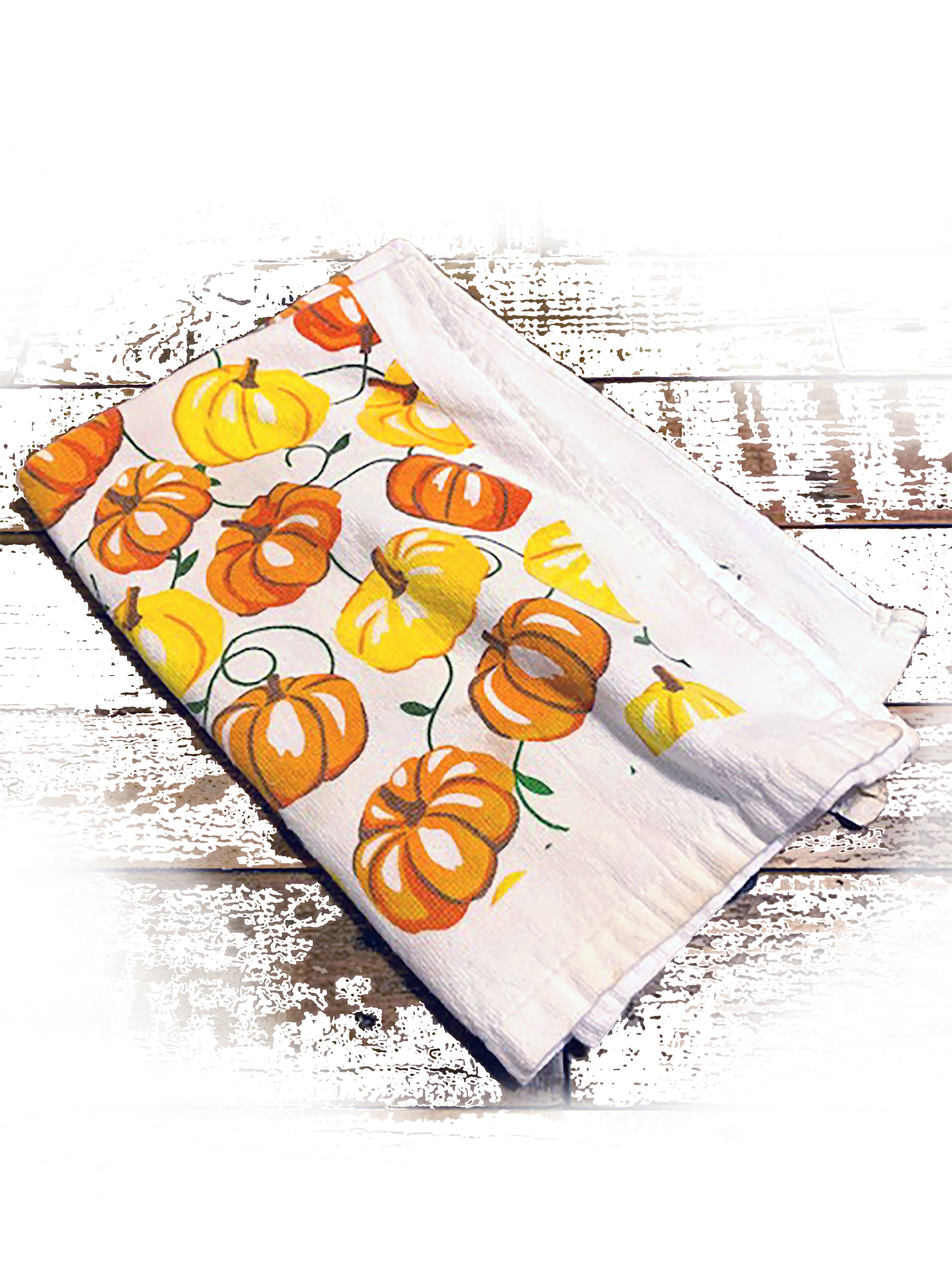    This is an old Kitchen Towel. Everyday when I clean the kitchen, the images of orange and yellow pumpkins bring me back to a season of creativity, family, and an overload of treats.   ~ De’Andre Burton  
