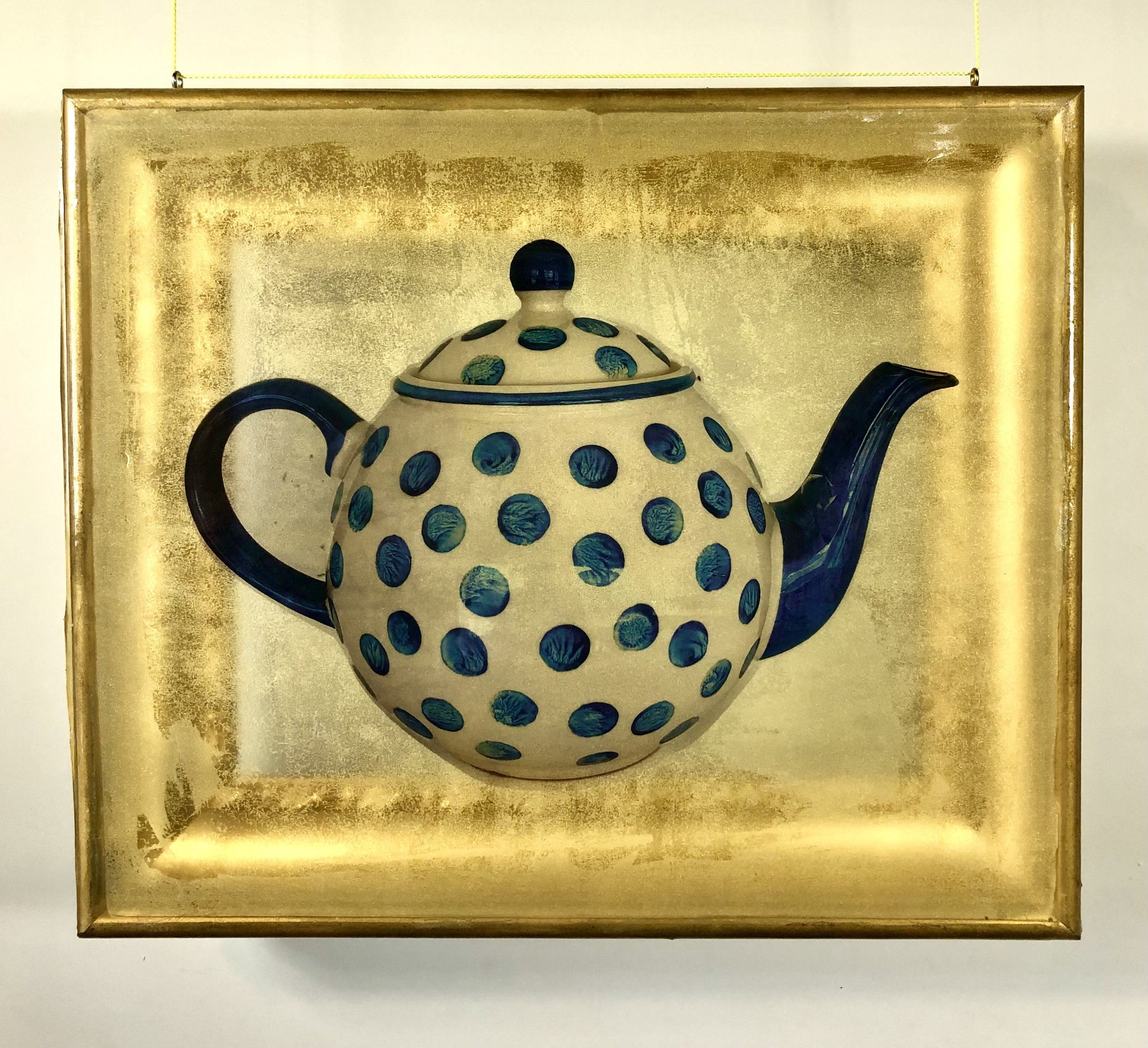   his Polka Dot Teapot was purchased on our honeymoon in British Columbia. On returning, I set a carry-on bag down to be screened at the airport and I heard a small but unmistakable sound of a crack. Now it serves as a delightful sight in an honored