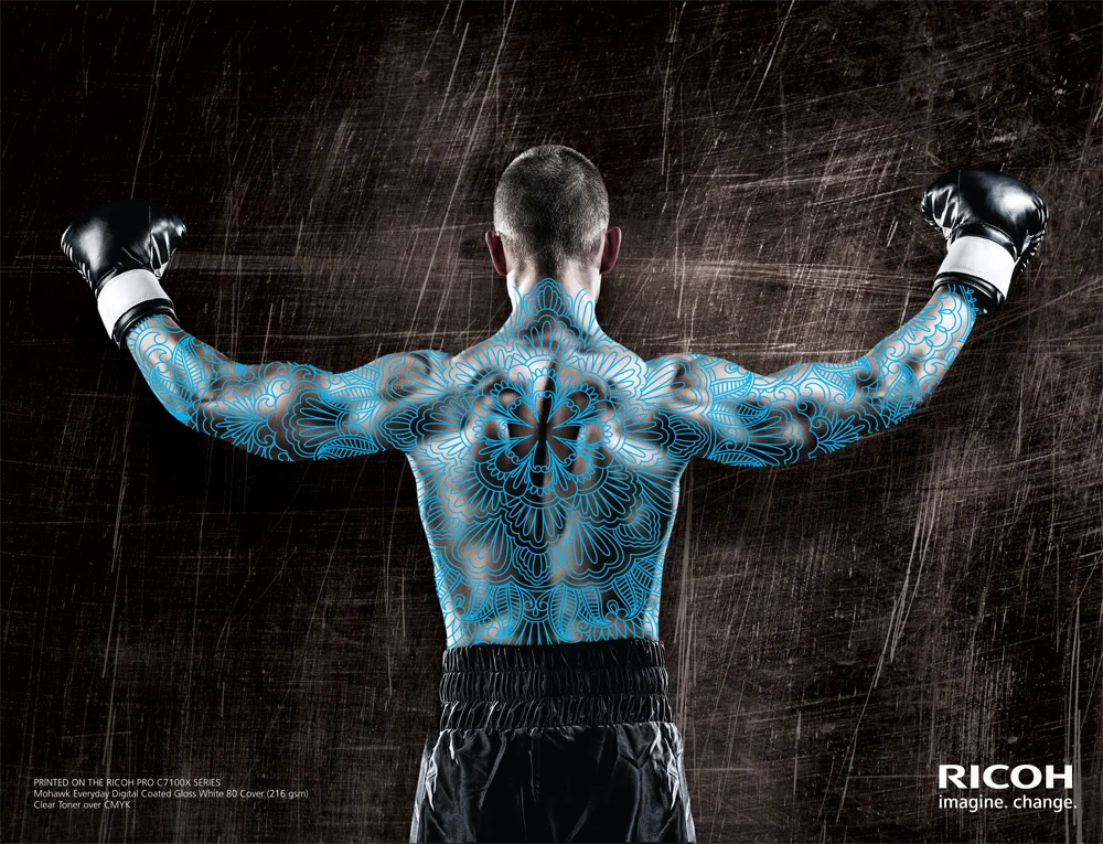 Muscle Back Pattern Demonstrates Clear Toner Enhancement cropped to a specific region. Suggested Media: Glossy 80 Cover Output: 12”x18” and trim Process: Clear Toner over CMYK