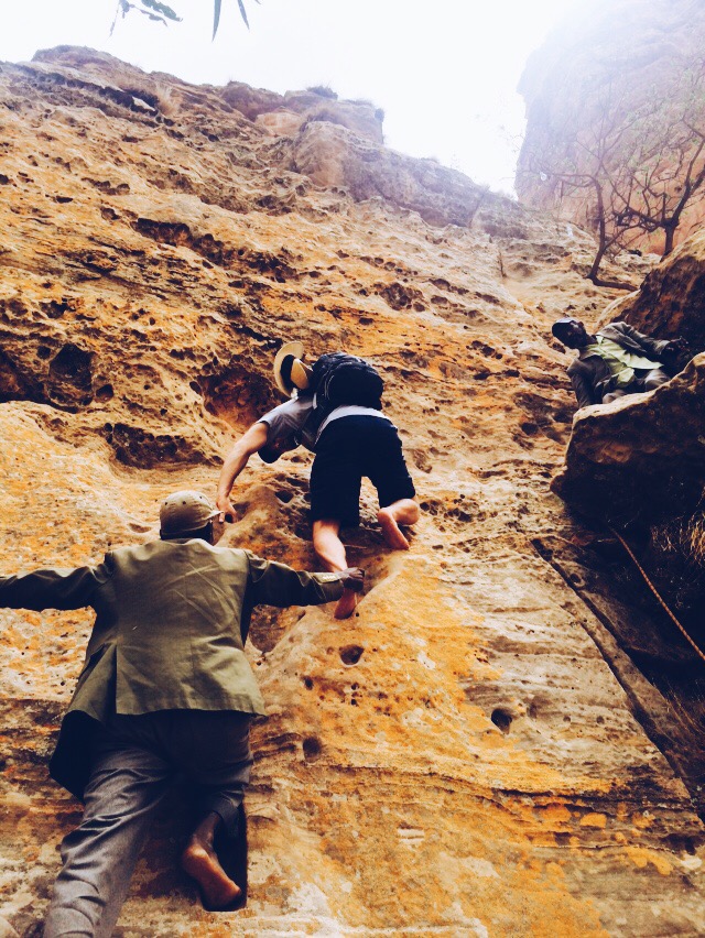 Scaling up to the entrance.