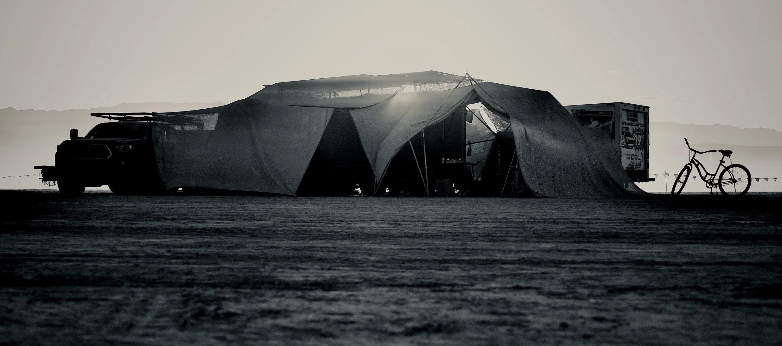  I hang out with the same bunch of people every year and we have become very close. This is our 2022 camp. My truck and all-important bike are on the far right. 