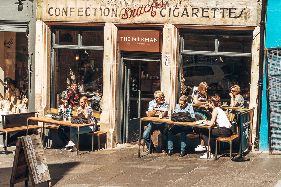 Customers-sitting-in-the-sunshine-at-The-Milkman-Edinburgh-Scotland.jpg