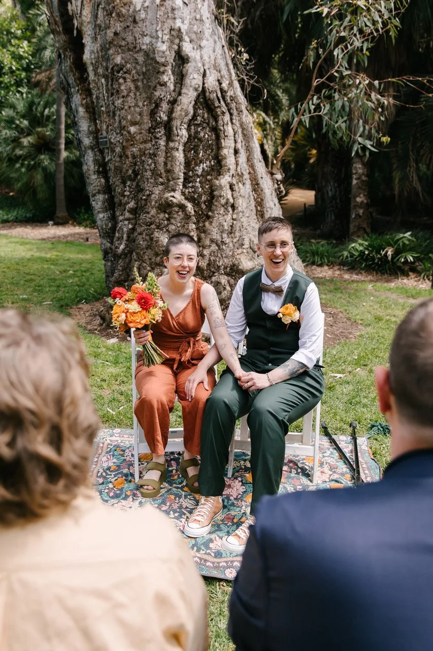 A small, seated, and beautifully relaxed wedding ceremony in the Adelaide Botanic Garden for Sam and Kelly