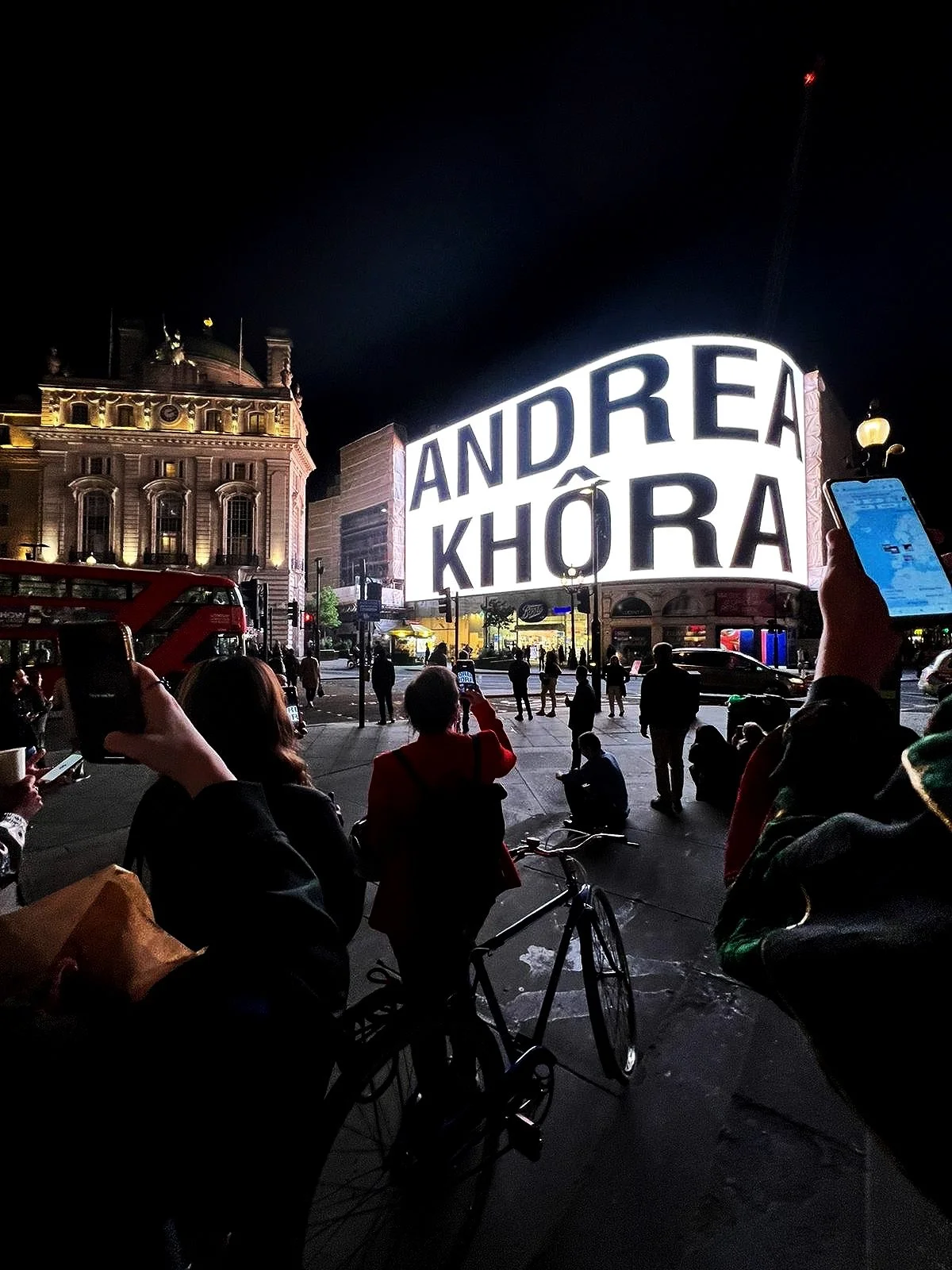 Artist Andrea Khôra on the screen at Piccadilly Circus for CIRCA x DAZED Class of 2022