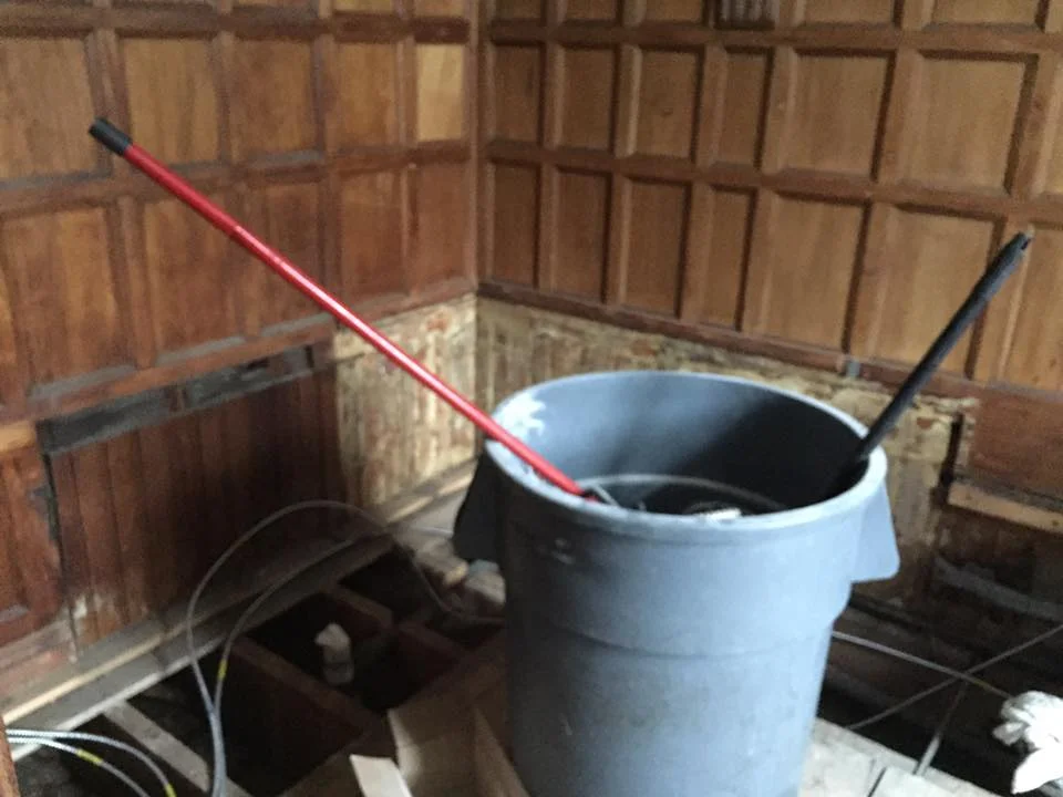 Removal of the standup shower and toilet.