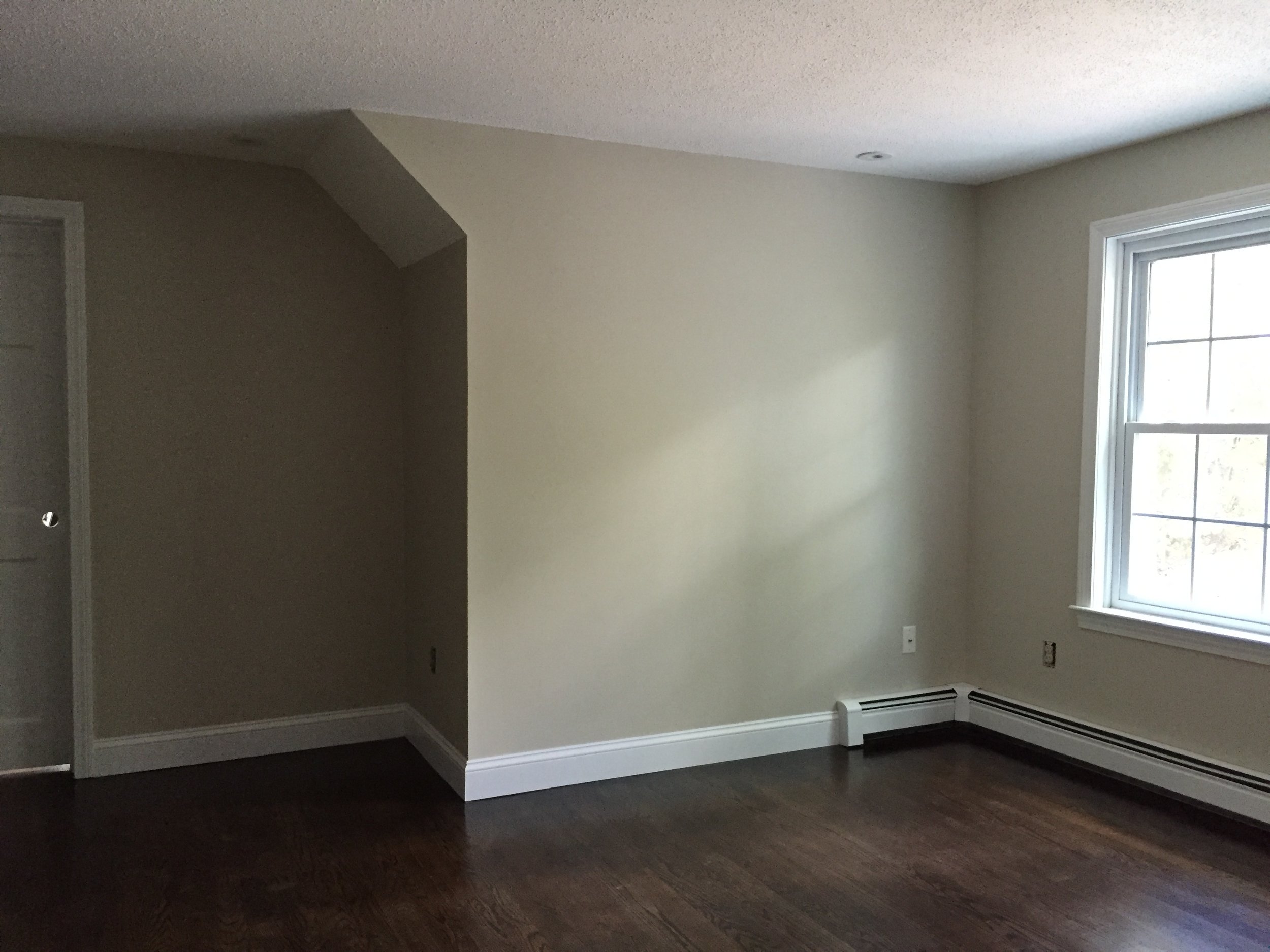 BEDROOM 1 - AFTER PAINT + WITH NEW FLOORING + STAIN + BASEBOARD (SPOILER!)