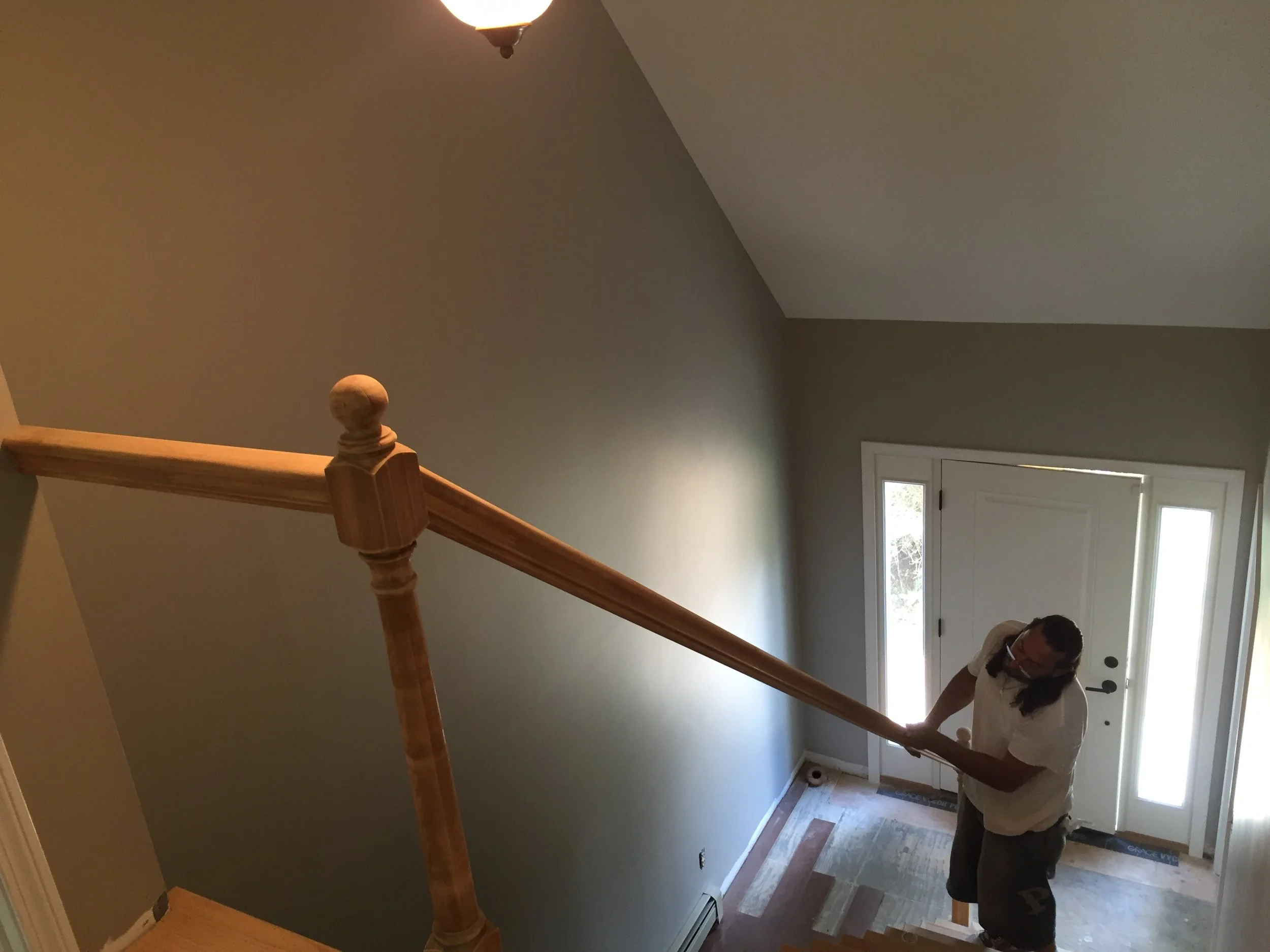 PROGRESS - Entry Stairs railing sanded for refinishing