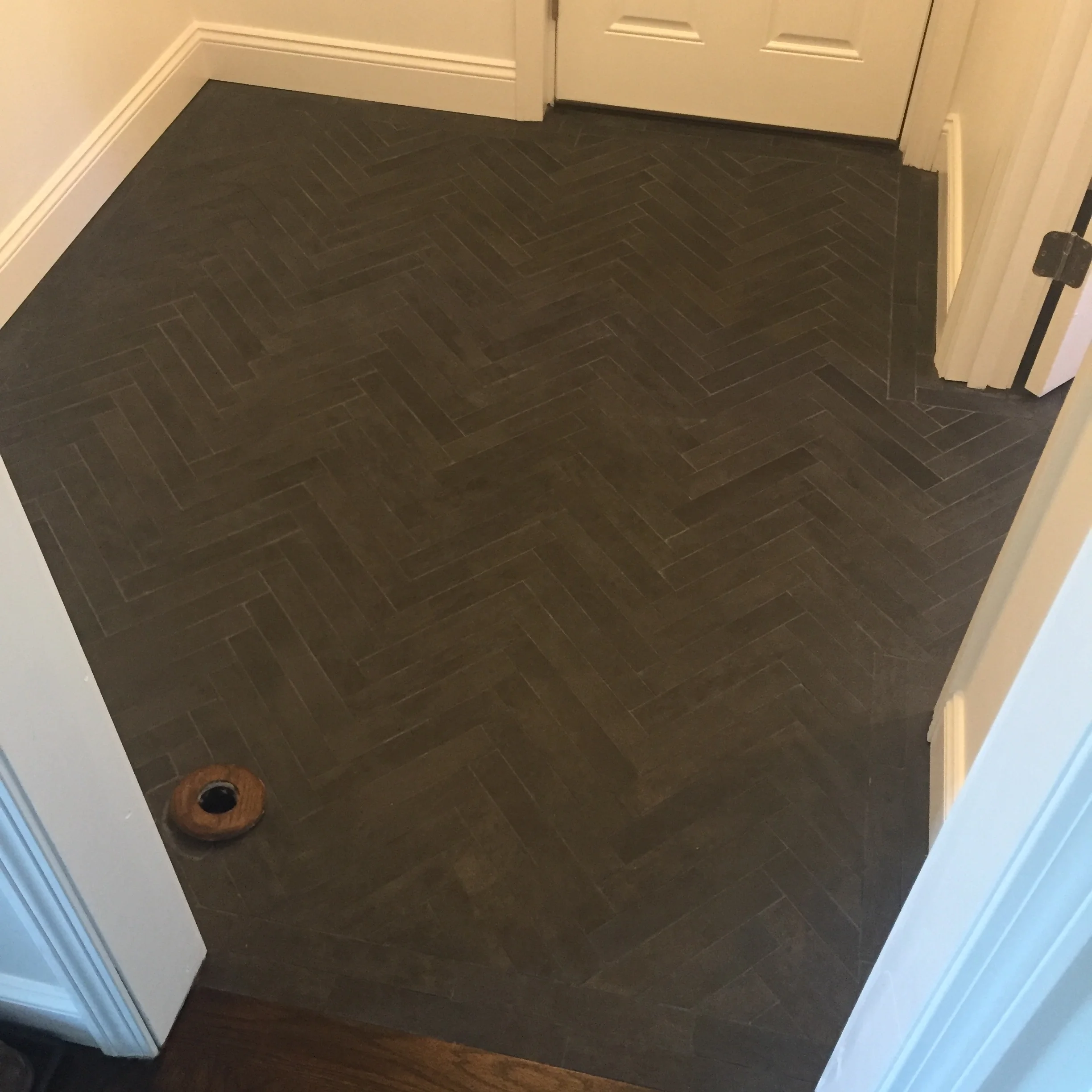 Tile Complete with Plastered Walls, Paint and Baseboard