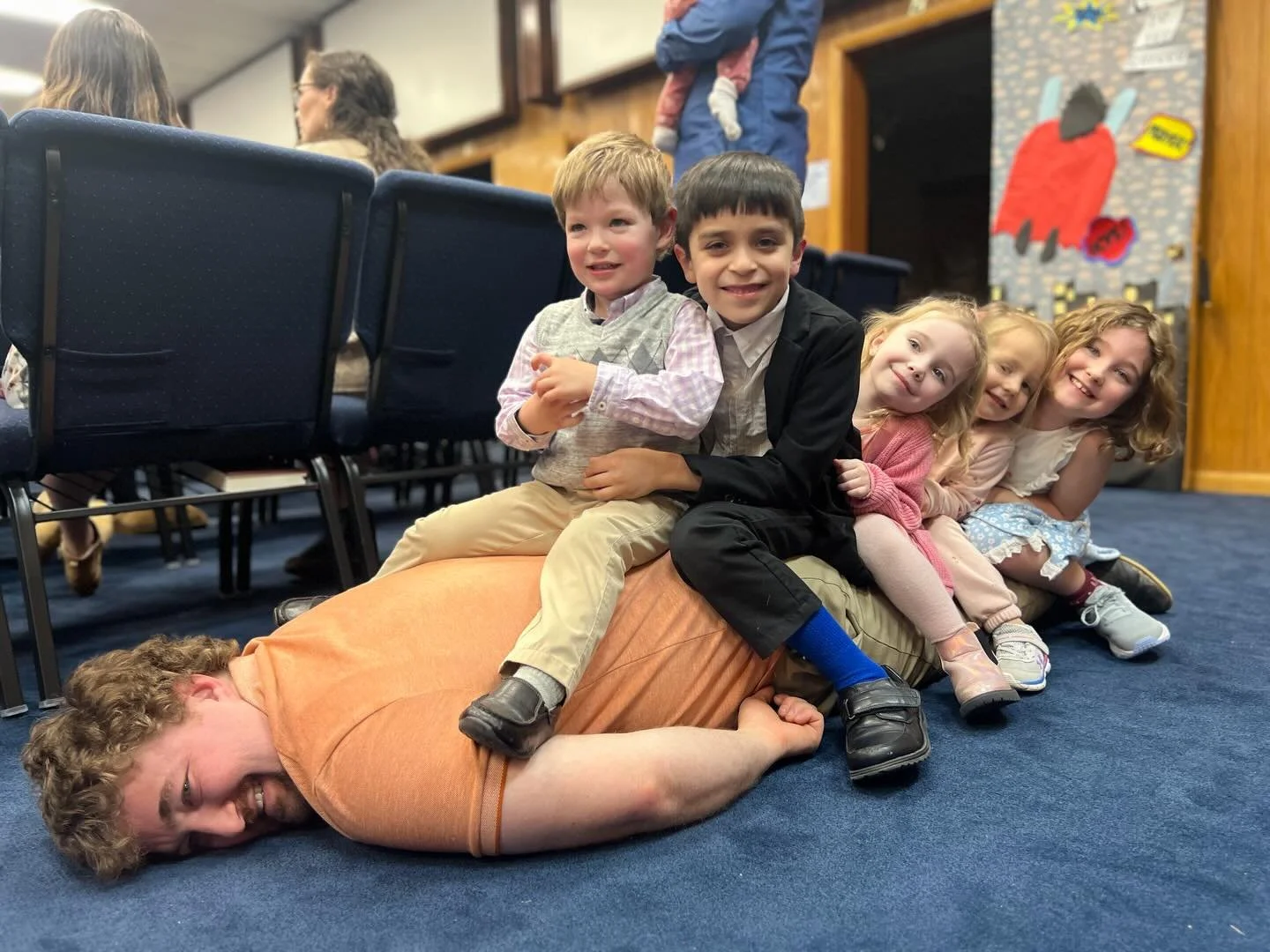 Last February&hellip; and honestly, every Sunday since. 😂

After church it never fails, your own kids pile on&hellip; then everyone else&rsquo;s kids pile on&hellip; and suddenly Dwight is getting the beatitudes beat into him by 47 tiny hands!💪😅

