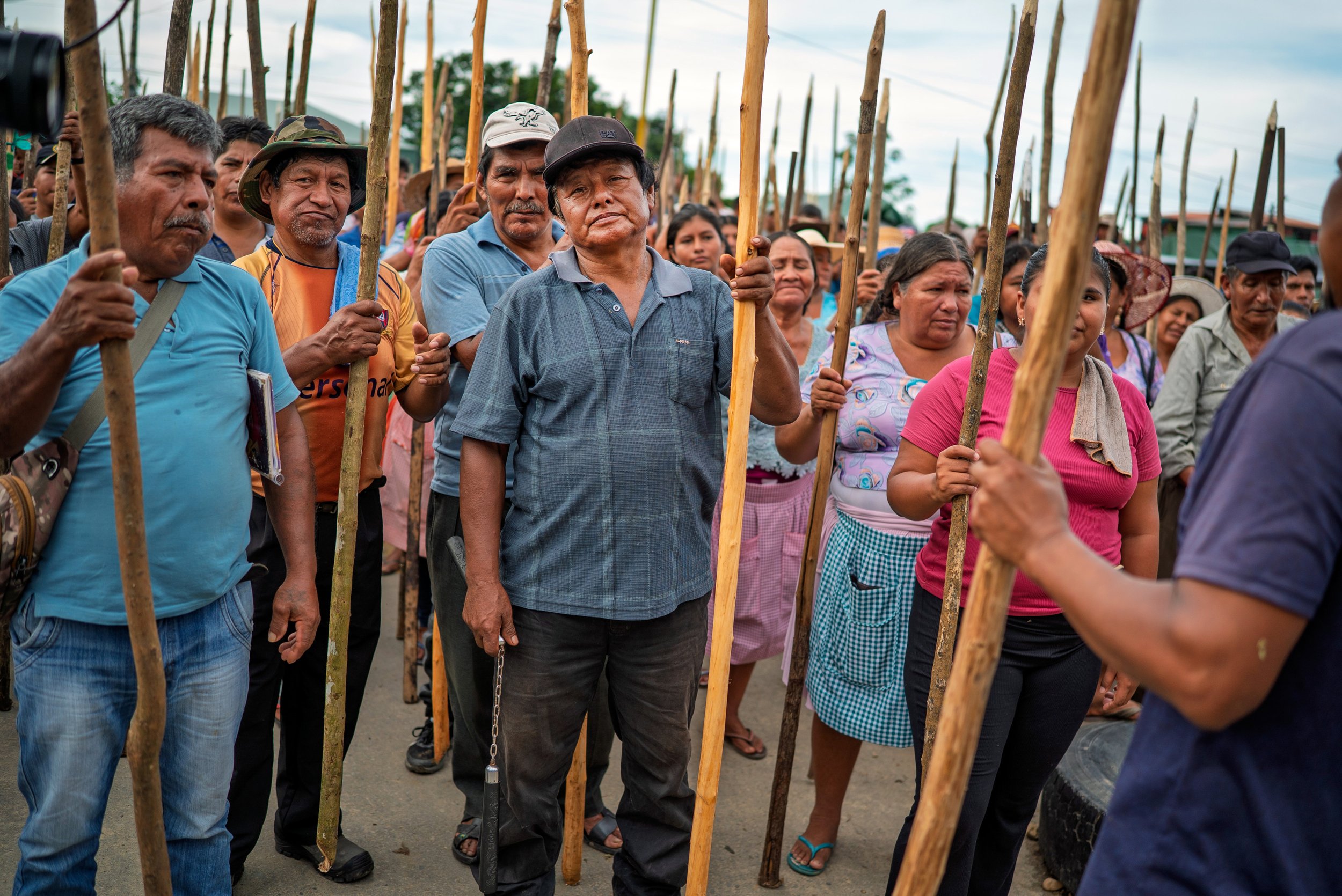 In a remote corner of central Bolivia, hundreds of coca farmers have armed themselves with sticks and makeshift shields to protect the country’s former president, Evo Morales.