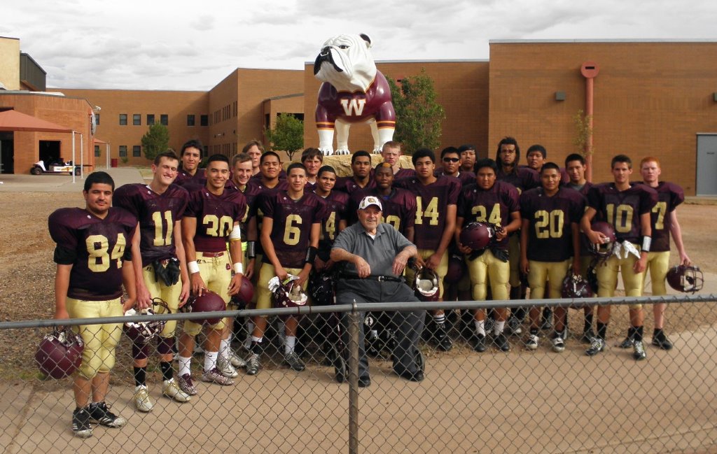  "Yes that is a real rock. Local radio station has named the&nbsp;bulldog&nbsp;Buster. The man in the middle with the team coached me. Emil Nasser coached  at&nbsp;Winslow&nbsp;High School for 35 years 1947 to 1983. He is 93 years old. He is still a&