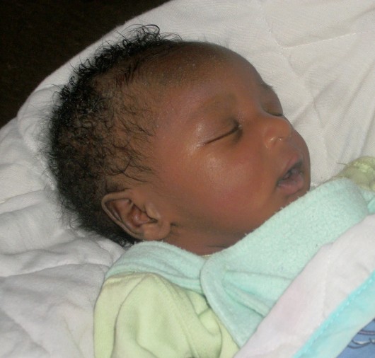 This baby, Emanual Gordon Odhiambo, was born to one of our staff in Kisumu last week. He got his middle name from me!