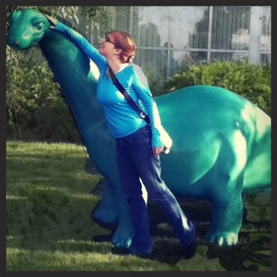 Petting friendly dinosaurs is just one of the many joys of being alive. See how happy we are together? Life is pretty great.